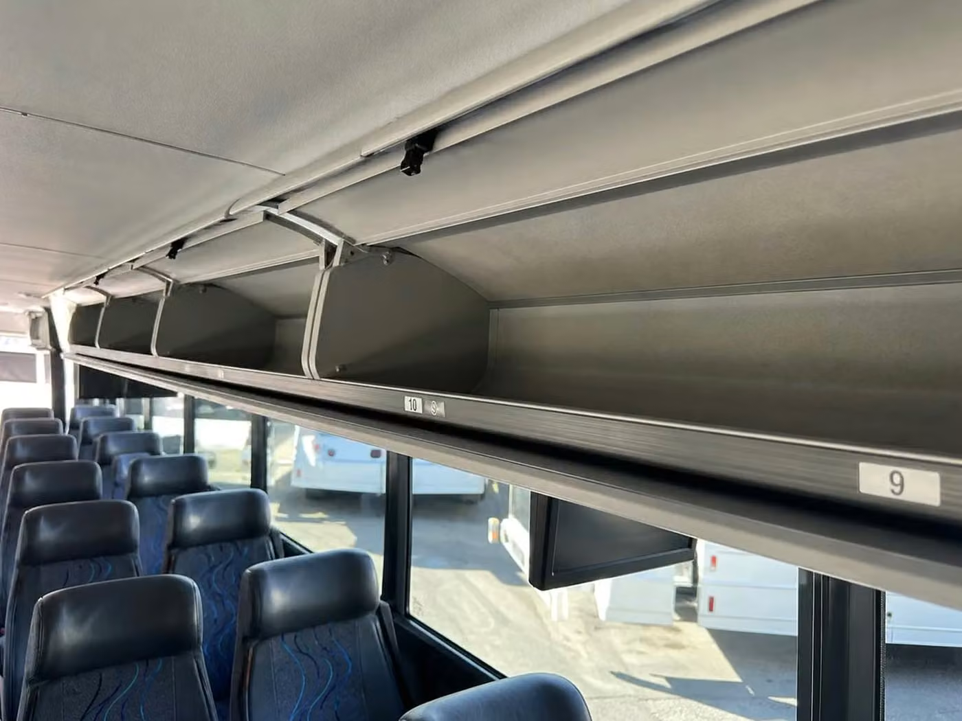 gadsden 18 passenger minibus overhead storage