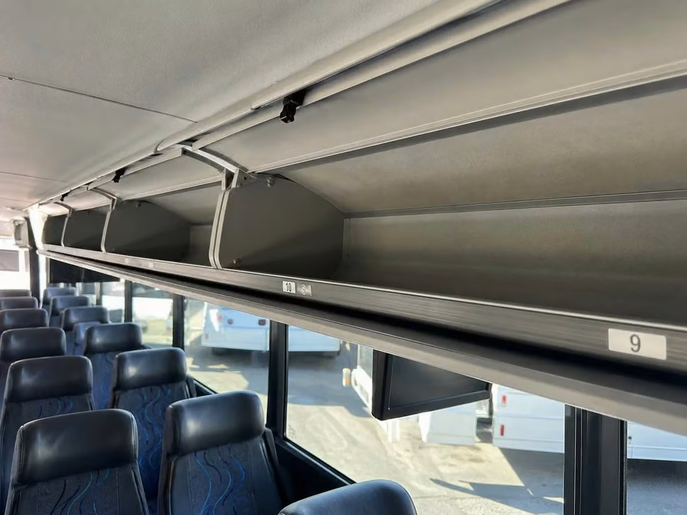 gadsden 56 passenger charter bus overhead storage